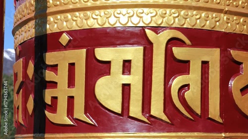 Rotating brass prayer wheels in Nepal monastery. Buddhist symbols, mantra engraving, spinning motion, cultural heritage, traditional ritual, spiritual architecture, Himalayas stock video