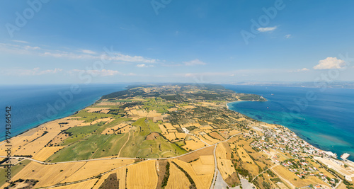 Fototapeta Naklejka Na Ścianę i Meble -  Seddulbahir, Turkey. Aerial view of Cape Helles and Teke Cape with WWI landing beaches S, V, W, X, Y and memorials at Gallipoli Peninsula entrance to Dardanelles. Aerial view