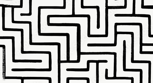 A black and white abstract maze pattern with sharp, angular lines creating a complex, repeating design.
