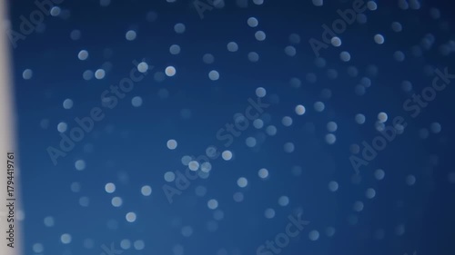 Abstract Blue Bokeh Background with White Element.