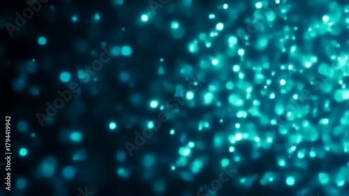 Abstract Blue Bokeh Lights Glittering and Shimmering on a Dark Background, Creating a Magical and Dreamy Atmosphere.