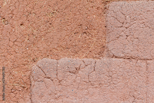 Photography Adobe bricks and clay wall texture with straw fibers, traditional earthen construction in natural light, Pisac, Písac, Sacred Valley, Cusco, Peru