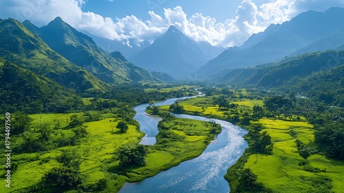 Scenic river flowing through lush green valley landscape