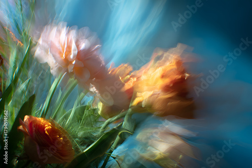 flowers moving softly in the breeze with natural motion blur and a bright open space in the middle
