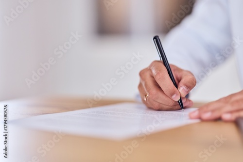 Professional Signing A Document: Close-Up Of Hand Writing On Paper With Pen