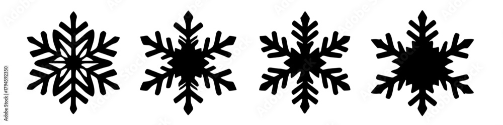 Fototapeta premium four unique black snowflake silhouettes on a white background, perfect for winter holiday designs