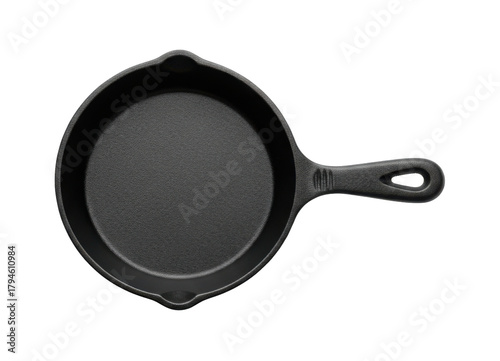 A top-down shot of a black cast iron skillet with a handle, ready for cooking.