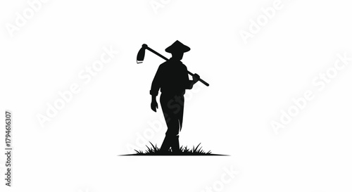 silhouette of a man with a hoe
