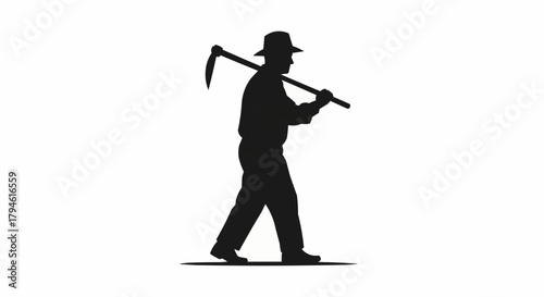 silhouette of a man with a hoe