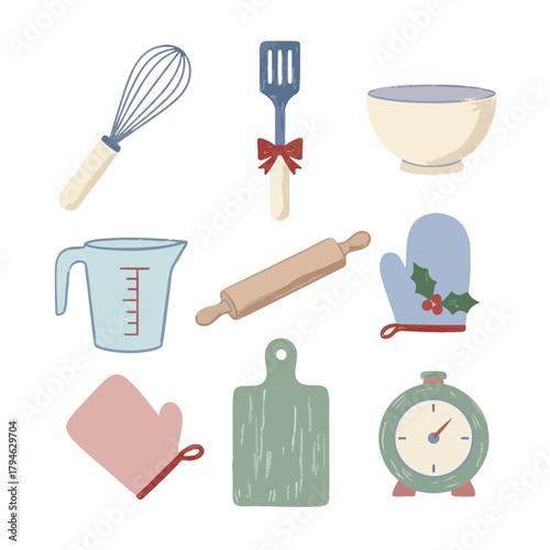 Flat lay of various Christmas baking utensils and tools, including a whisk, spatula, mixing bowl, rolling pin, and oven mitts, arranged on a clean white background with a festive holiday