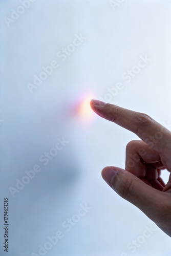 Wallpaper Mural Macro Close-Up of Fingertips Touching Smooth Surface with Soft Glowing Gradient Response Torontodigital.ca