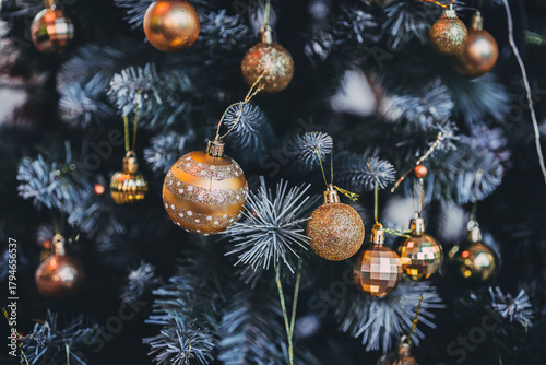 Merry x-mas,Close up of Colorful balls ,gifts box and Christmas greeting picture parcel,bell decoration on Green Christmas tree background Decoration During Christmas and New Year.