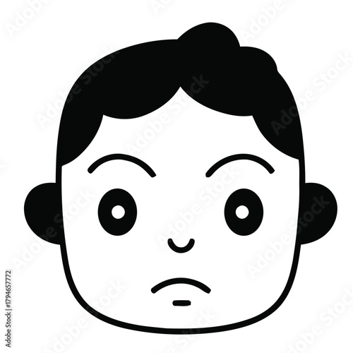 Young boy's frustrated face conveying annoyance and unhappiness with downturned mouth and furrowed brow