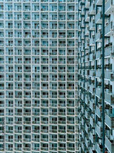 фотографія Repeating Grid Pattern Modern Residential Building Facade in Makati, Philippines
High-rise apartment building facade in Makati City, Metro Manila, Philippines