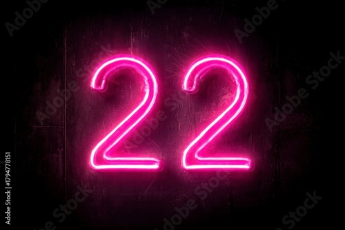 Bright Neon Number 22 in Vibrant Pink Glow Against Dark Background