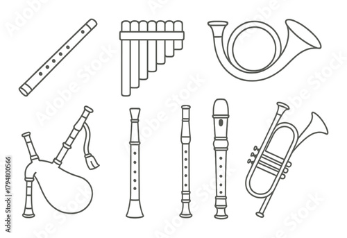 Various wind instruments silhouette on sepia background