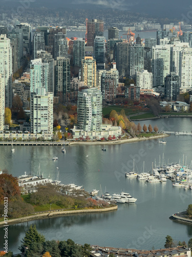 Modern downtown Vancouver skyline with False Creek and Yale town waterfront in autumn colors, British Columbia, Canada
