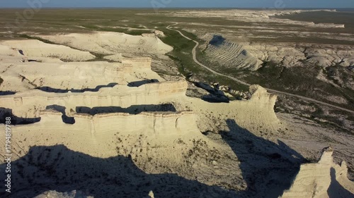 The Akkergeshen (or Akkegershin) limestone plateau in the Atyrau region, Kazakhstan. The Cretaceous Highlands. Nature-carved sculptures. The snow-white castles of the Caspian Plateau. Drone.4K