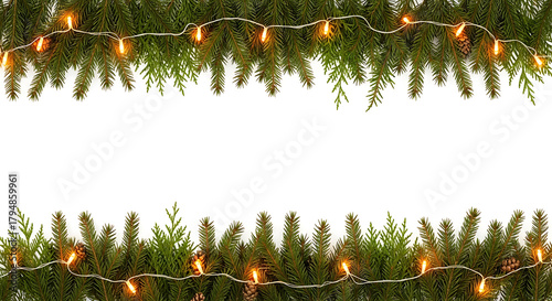 Christmas fir tree branch garland border with glowing festive lights isolated on a white background for holiday design