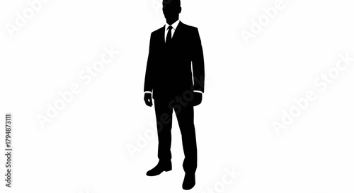 Silhouette of a professional man in a suit standing confidently.