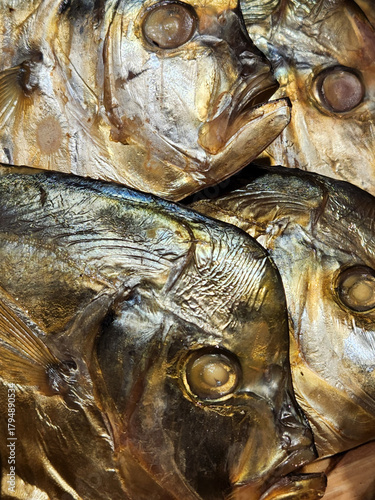 Smoked fish. Background with smoked fish. Fish roach