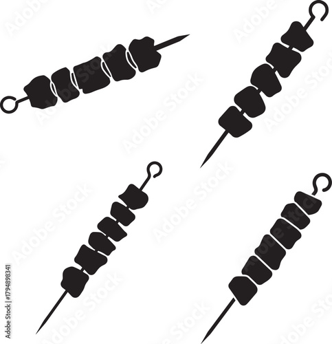 Four meat skewers with cubes of meat in a silhouette style isolated on transparent background