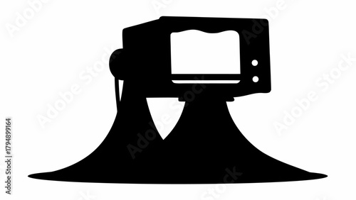 Silhouette of a vintage television set resting on two large trumpet like stands in black and white