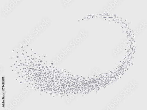 Abstract swirling pattern of small particles forming a crescent shape