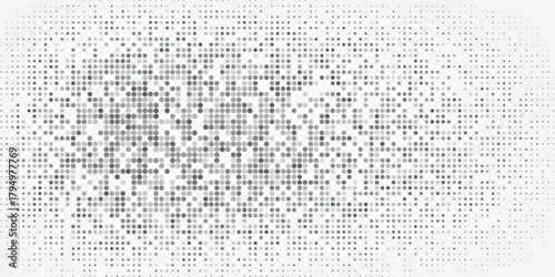 Monochrome abstract dot pattern with fading gradient for modern graphic design.