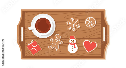 Top-down view of a wooden tray with a cup of hot chocolate and a variety of festive Christmas gingerbread cookies.