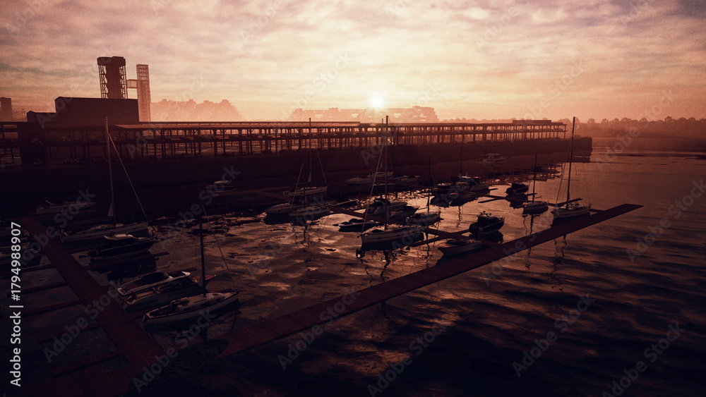 Obraz premium A serene marina at sunset shows boats bobbing gently in the water, with warm colors painted across the sky. Shadows of the dock and buildings create a tranquil evening atmosphere.