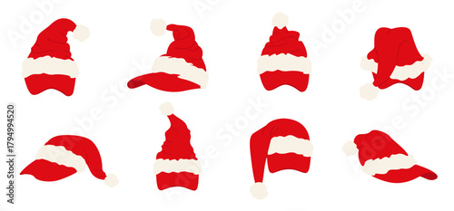 A set of red Santa hats with sun visors on a white background. Festive Christmas headwear with white fur trim and a pom-pom of various shapes. A traditional Christmas element.
