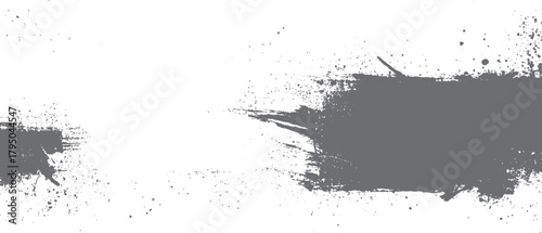 Grey paint splatters and brush strokes on a white background abstract texture black brushstroke