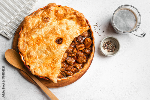 Beef steak pie with dark beer gravy and crispy puff pastry