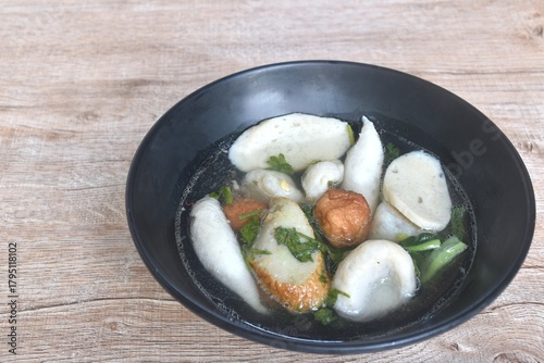 boiled fish and shrimp  meatball with cabbage in clear soup on bowl  