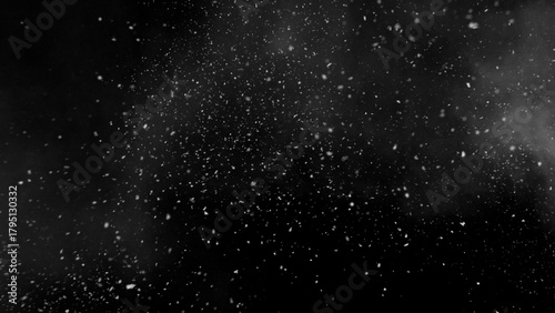 Photography Freeze motion of snow and atmospheric smoke isolated on black background