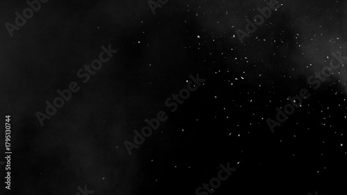 Freeze motion of snow and atmospheric smoke isolated on black background