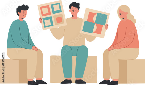 Three people sit together while one presents colorful geometric artwork panels during a casual group discussion