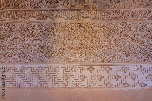 Decoration on walls of Nasrid palace in Alhambra, Granada, Spain