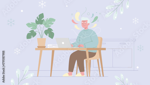 Cheerful senior using a laptop for cozy winter work showing creativity and inspiration at home