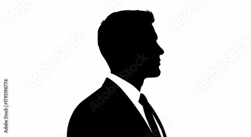 Silhouette of a man in a suit, profile view, professional appearance, formal attire.