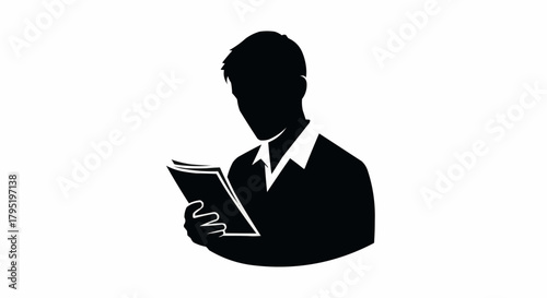 Silhouette of a man reading a book intently.