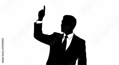 Silhouette of a businessman pointing upwards, symbolizing ambition and leadership.