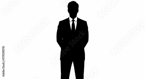 Silhouette of a man in a suit standing with hands behind his back.