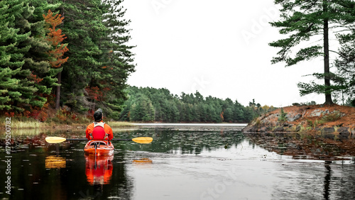 Solo Male Kayaker on Bell Lake in Killarney Provincial Park in Fall