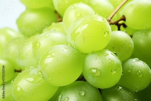 Close-up of a Fresh, Juicy Cluster of Green Grapes Indoors with Water Droplets, Showcasing Crispness, Sweetness, and Healthy Fruit.