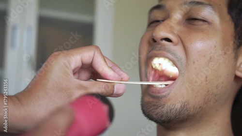 Healthcare, consulting and doctor with person and throat in hospital for cancer, sick and surgery. Medicine, medical and check up with woman and patient in clinic for wellness, virus and mouth exam