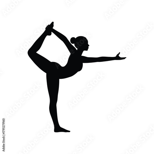 Silhouette of a woman performing a yoga pose