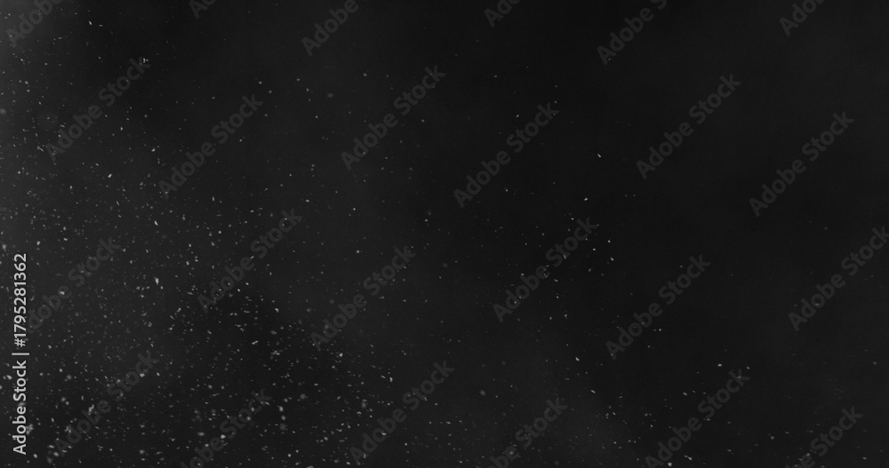 Obraz premium Falling snowflakes with fog. isolated on black background. Winter snow overlay texture for VFX, compositing, motion graphics and atmospheric effects