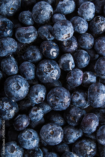 fresh blueberries closeup, ripe berries, healthy fruit, dark background